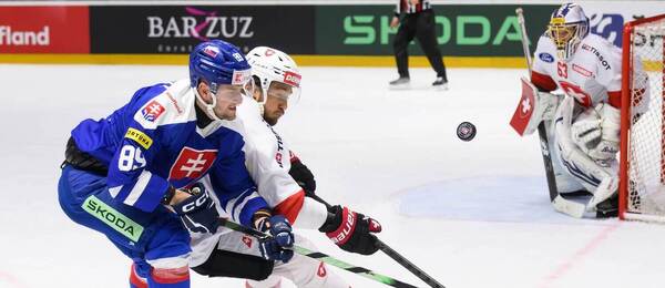 Adrián Holešinský (Slovensko) a David Aebischer (Švajčiarsko)