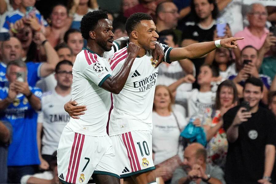 Vinicius Júnior a&nbsp;Kylian Mbappé (vpravo)